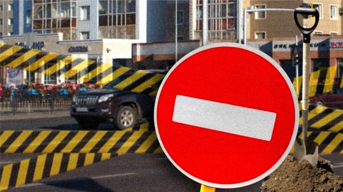 Внедорожник провалился в яму на дороге в Павлодаре